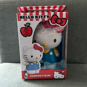 Dancing Hello Kitty is battery operated and new in box.